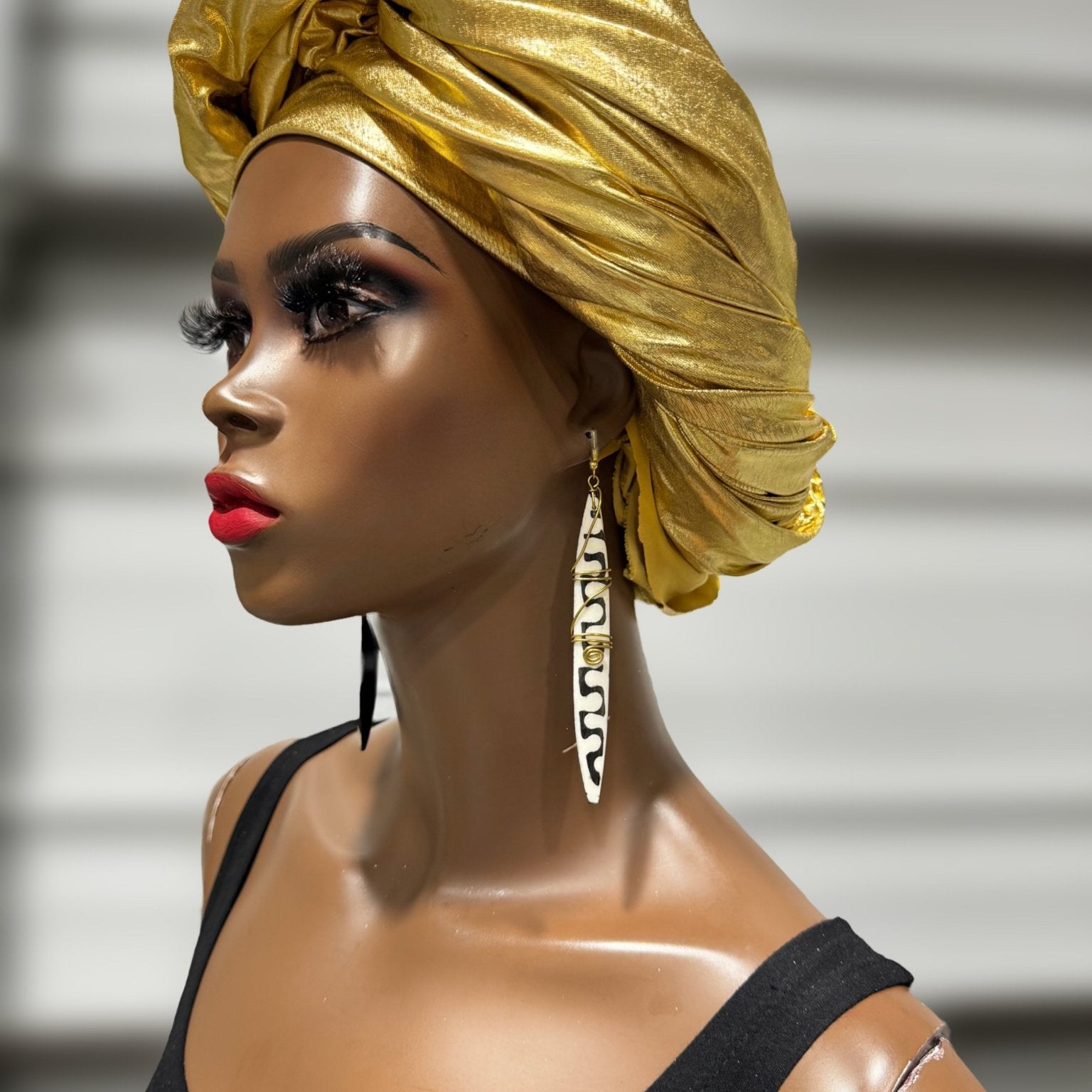 Bone earrings with coiled spring - Trufacebygrace