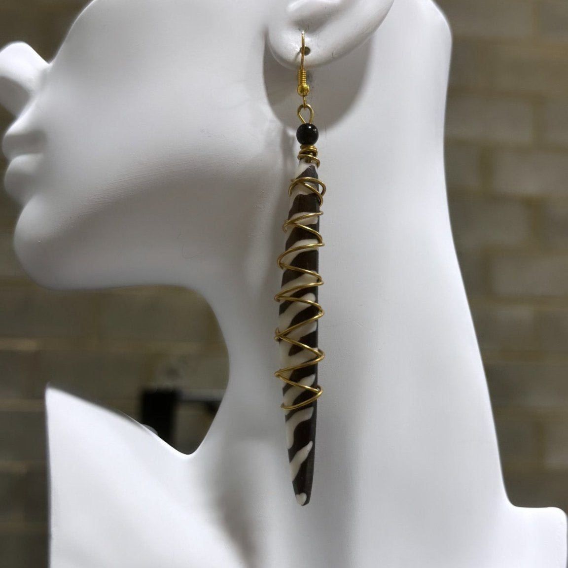 Bone earrings with coiled spring - Trufacebygrace