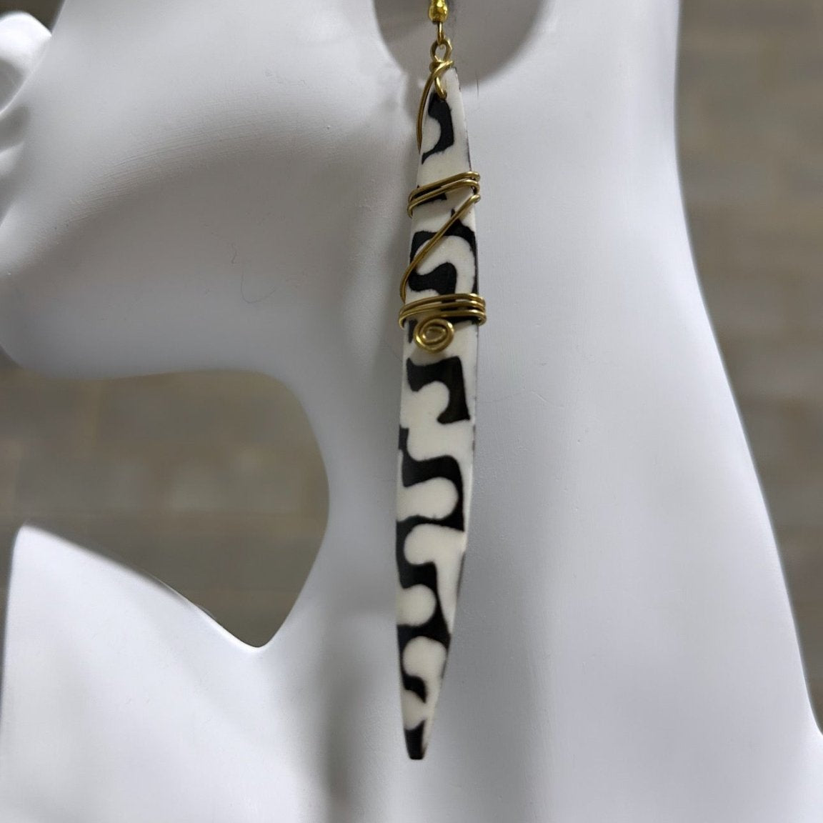 Bone earrings with coiled spring - Trufacebygrace
