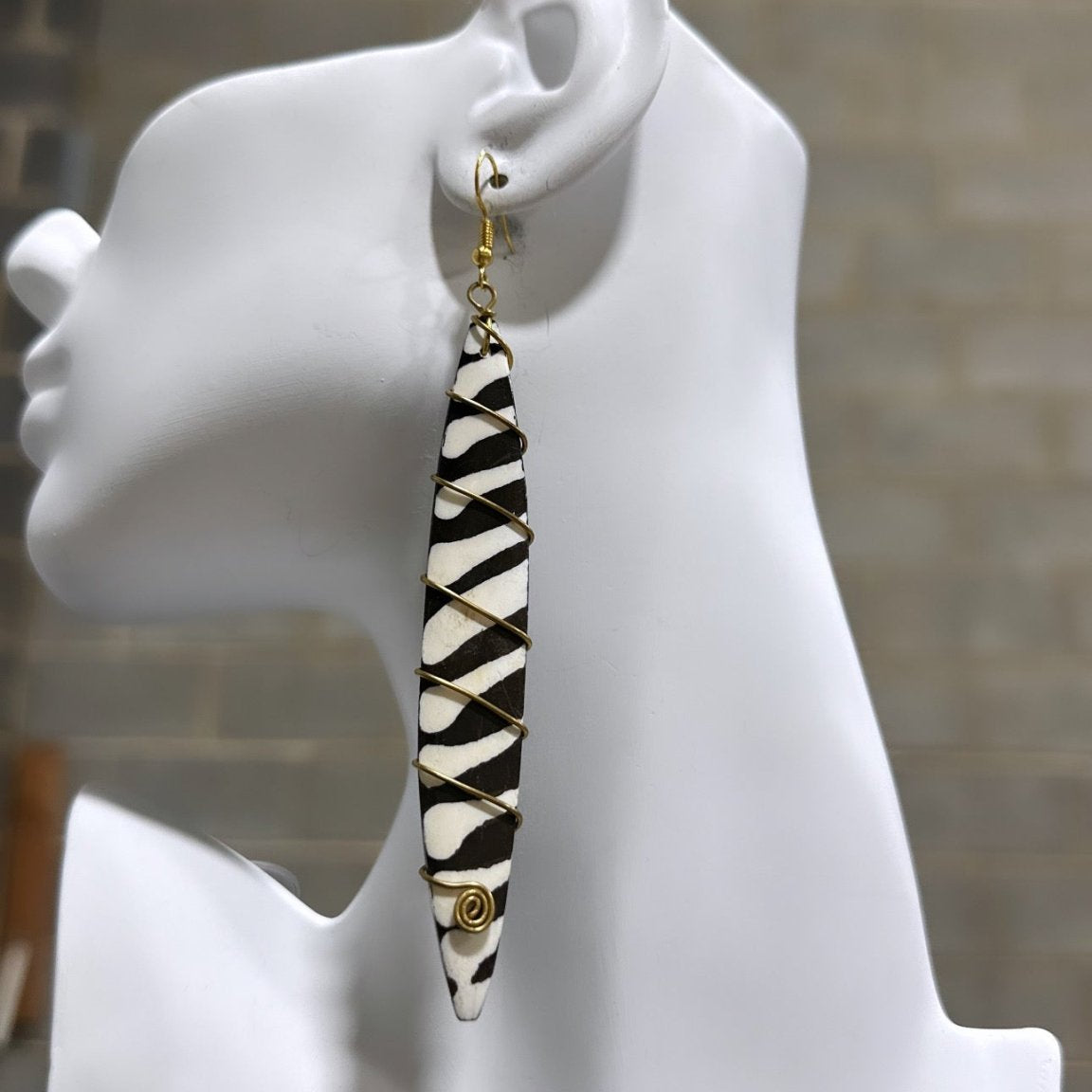 Bone earrings with coiled spring - Trufacebygrace