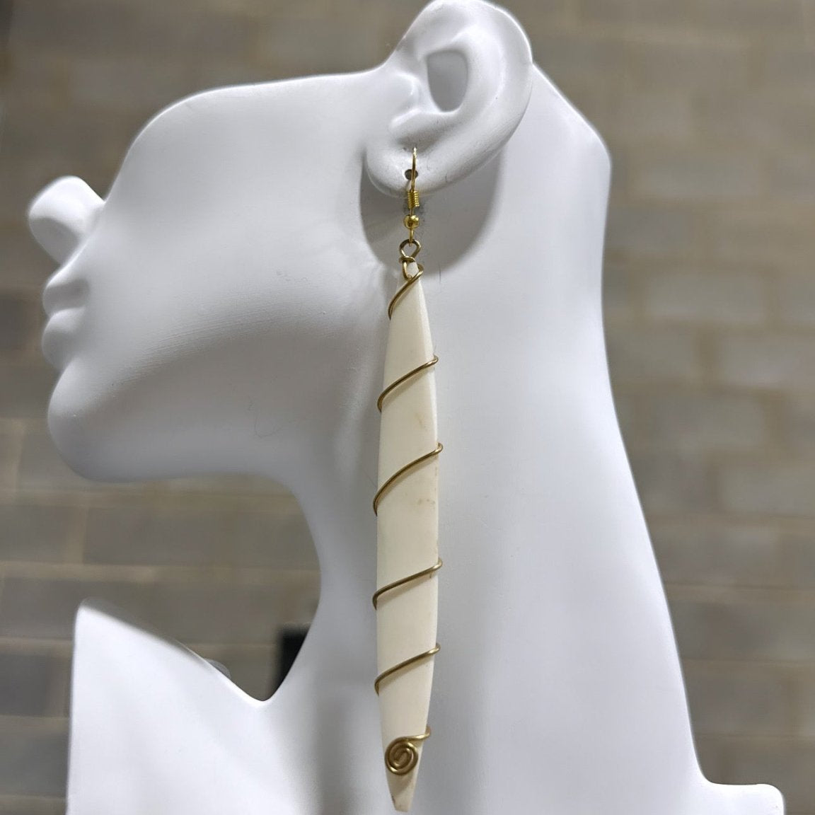 Bone earrings with coiled spring - Trufacebygrace