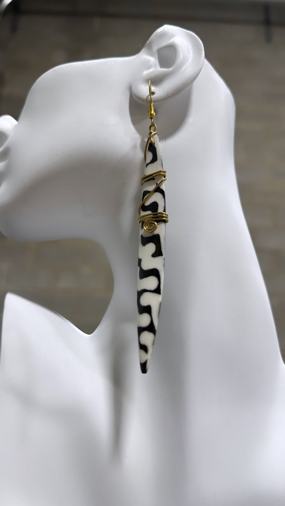 Bone earrings with coiled spring - Trufacebygrace