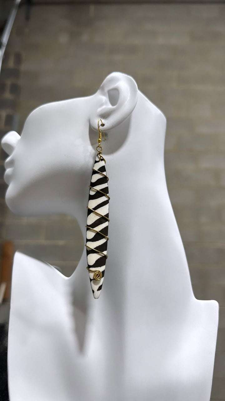 Bone earrings with coiled spring - Trufacebygrace