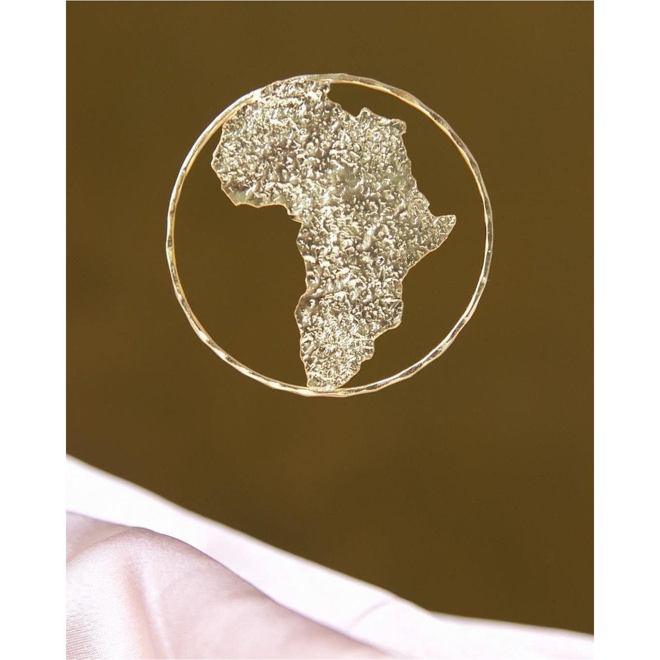 Africa to the World Brass Ring - Trufacebygrace