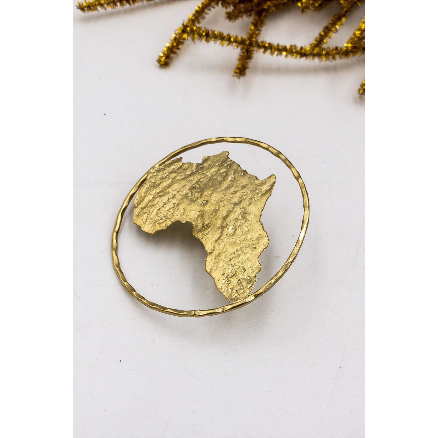 Africa to the World Brass Ring - Trufacebygrace